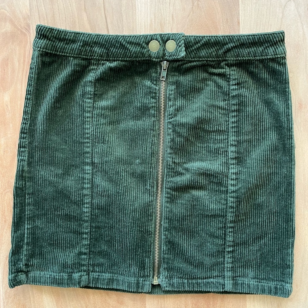 Green corduroy zip mini skirt